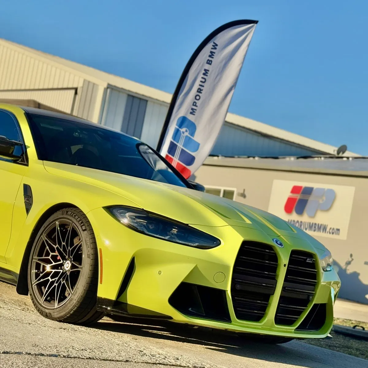 local-bmw-specialists-collin-county-tx "Trusted local BMW specialists at Mporium BMW inspecting a high-performance engine to maintain the standard of the ultimate driving machine.